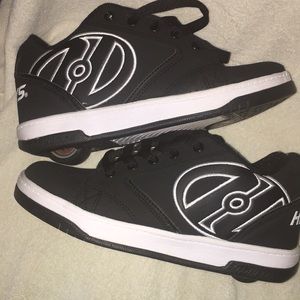 Gently used original black and white heelys